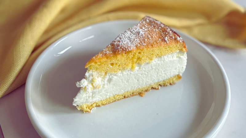 Slice of cheesecake on white plate