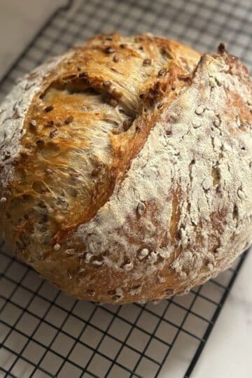 German Mischbrot (Spelt and Rye) Loaf of Bread on cooling rack