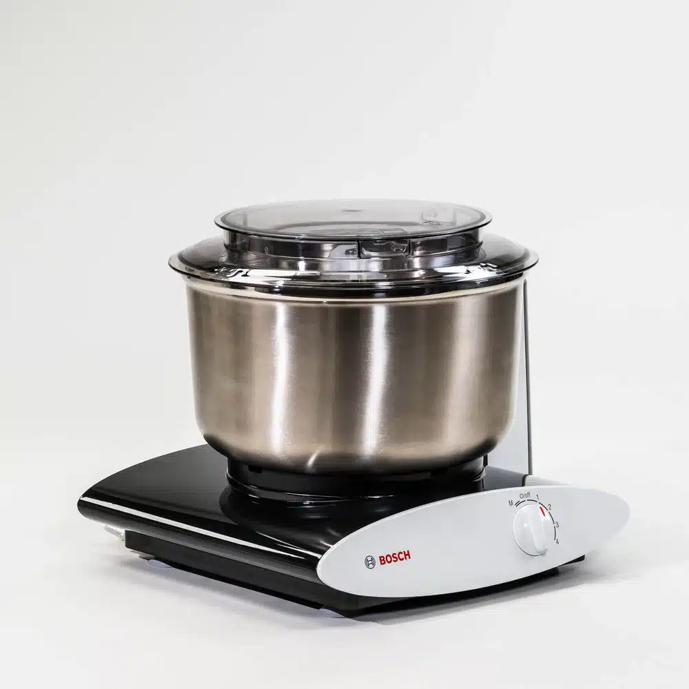 Bosch stand mixer with stainless steel bowl.