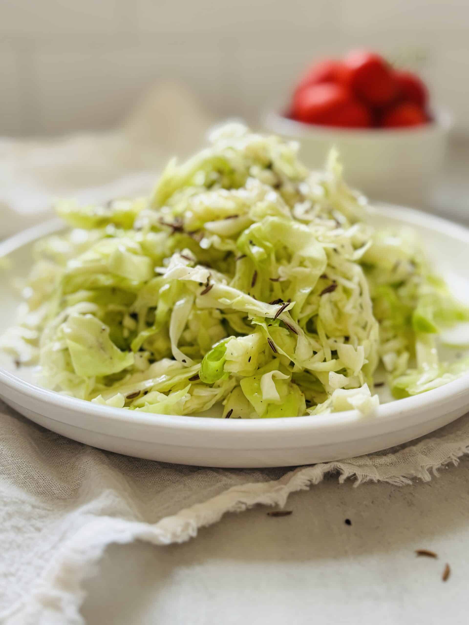 Plate of fresh cabbage salad with seeds.