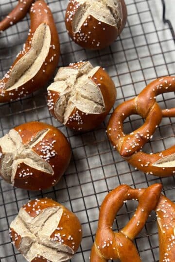German Pretzels and Pretzel Rolls laying on cooling rack
