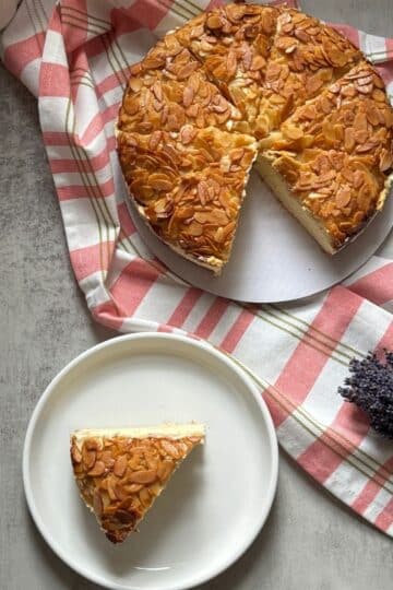 Bee Sting Cake Slice with Almond on a Serving Plate