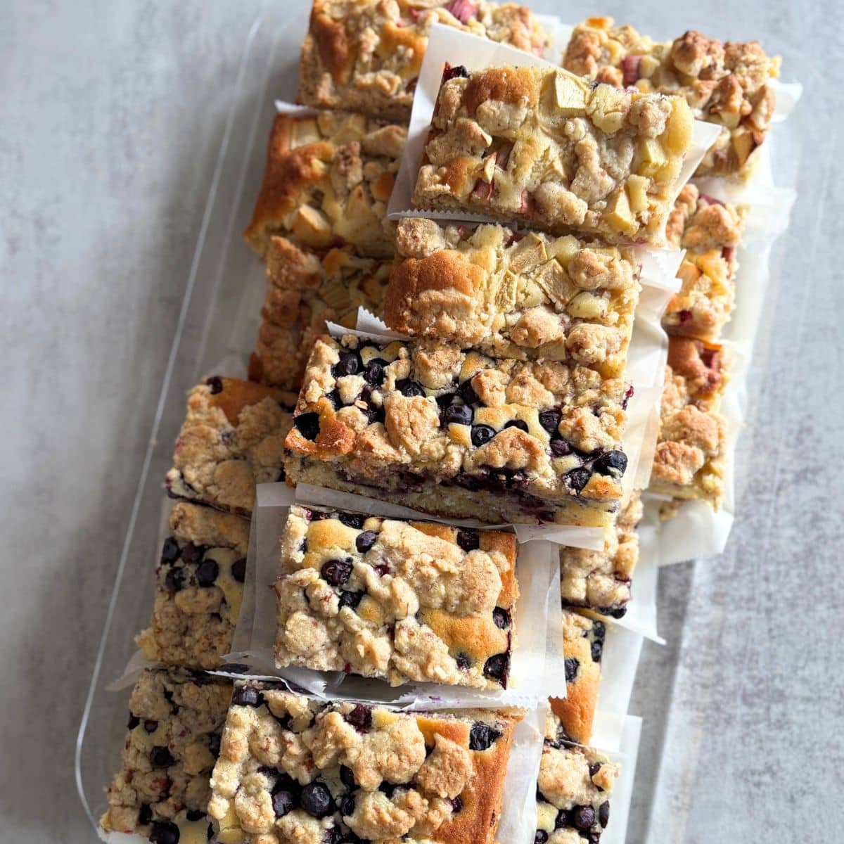 Streusel Cake Slices with Fruit on a Serving Platter