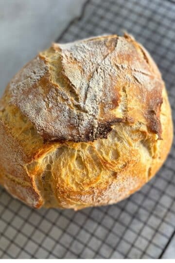 Rustic Yogurt Bread Loaf on cooling wire